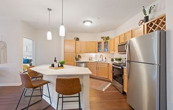 Kitchen With Dining Space at The Bluffs at Nine Mile Creek, Minnesota